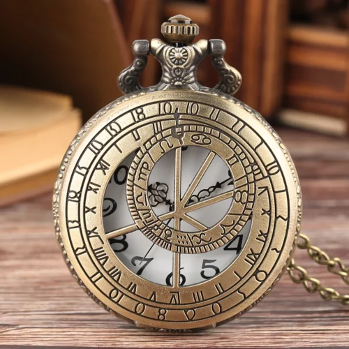 Montre ronde à finition bronze, couvercle ajouré à anneaux concentriques devant un cadran à chiffres arabes