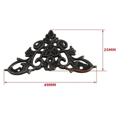 Ornement triangulaire couleur bronze à fleur centrale et volutes ajourées, avec dimensions 49 × 25 mm
